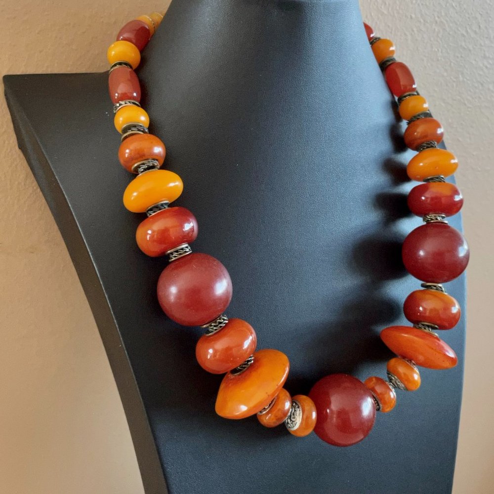 Moroccan Berber. Honey copal & cherry Copal resin beads in different shapes.